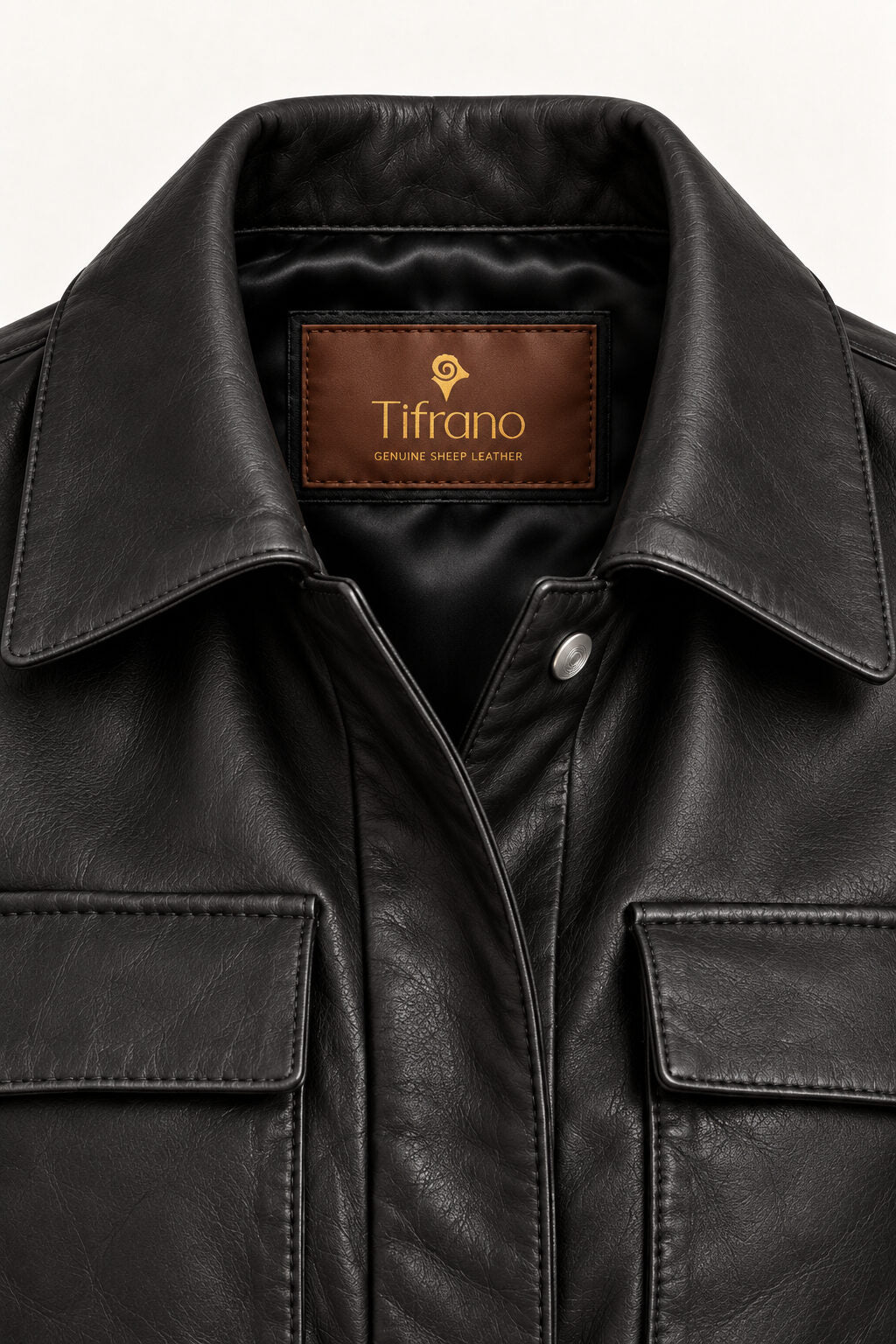 Close-up of the Belgrado black leather jacket, showing collar, buttons and leather texture