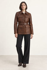 Woman wearing the Sarajevo antique brown leather jacket, full-body front view