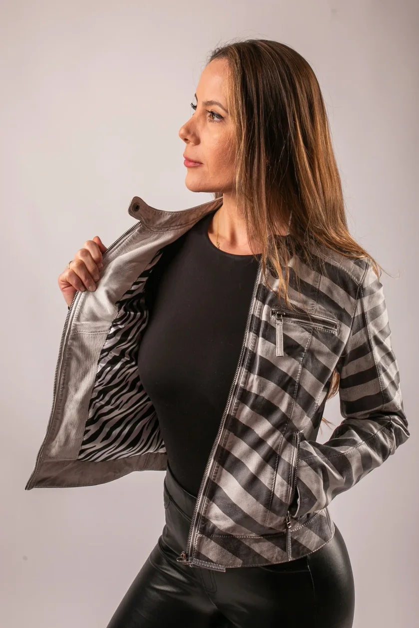 Nairobi grey stripe leather jacket on model open to show zebra lining, front view studio shot