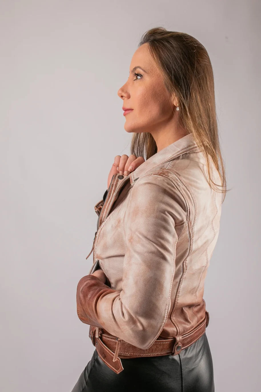 London gradient leather jacket side profile view on female model showing cream-to-brown fade