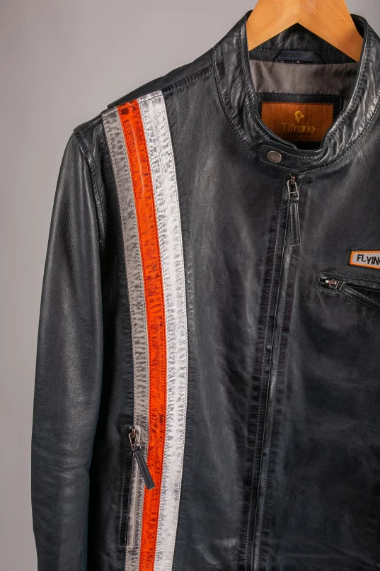 New York leather jacket close-up hanger shot showing orange and grey racing stripe and chest patch