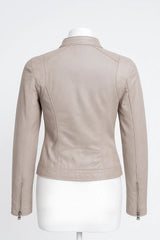Cream leather jacket on a mannequin against a white background