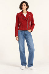 Woman wearing the Aphrodite red suede biker jacket, three-quarter view