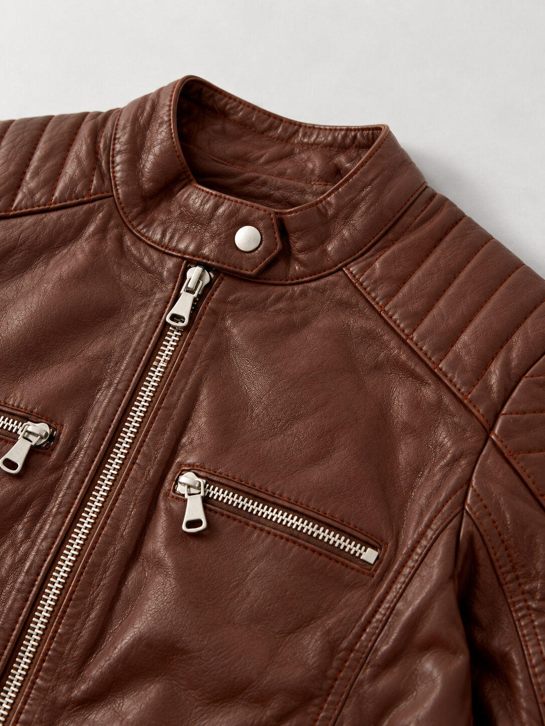 Lyon brown leather jacket by Tifrano, close-up detail of the round collar and front zipper