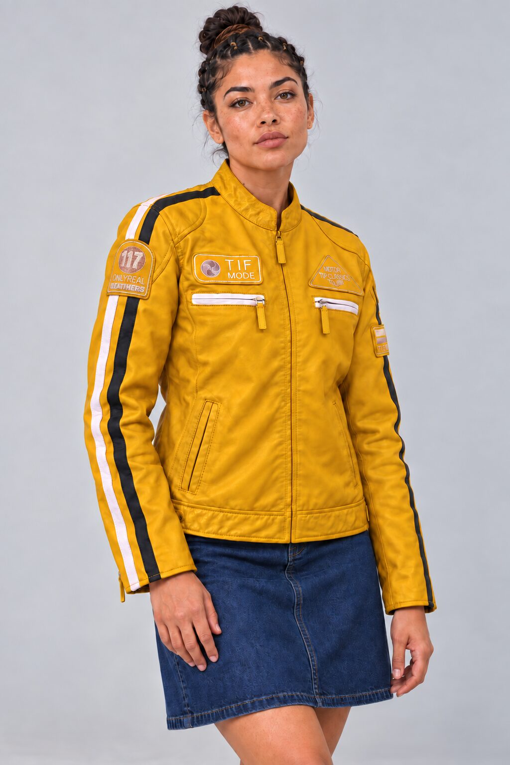 Woman wearing the yellow leather biker jacket, three-quarter view