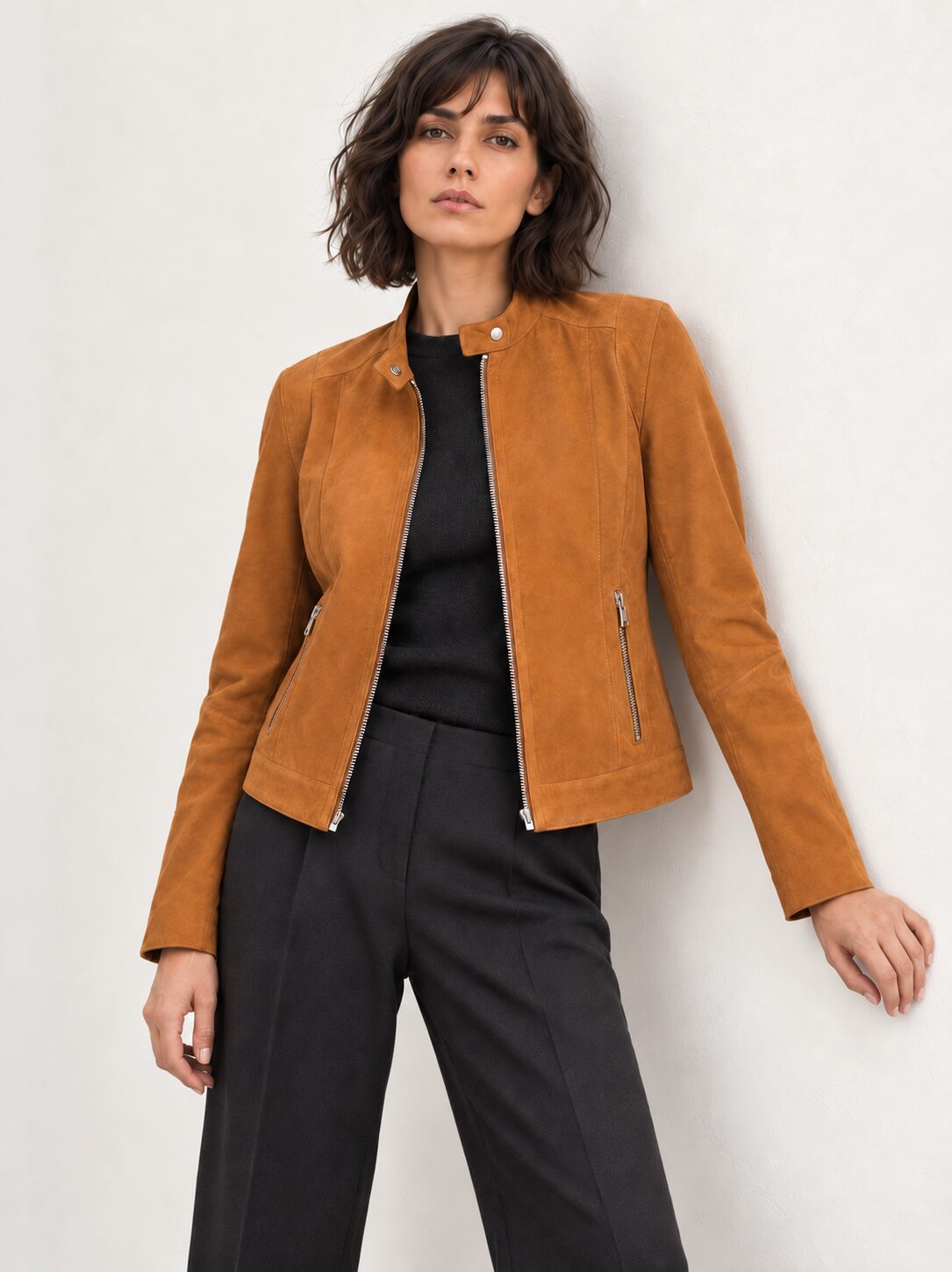 Woman wearing the Minerva camel suede jacket, alternate full-body view