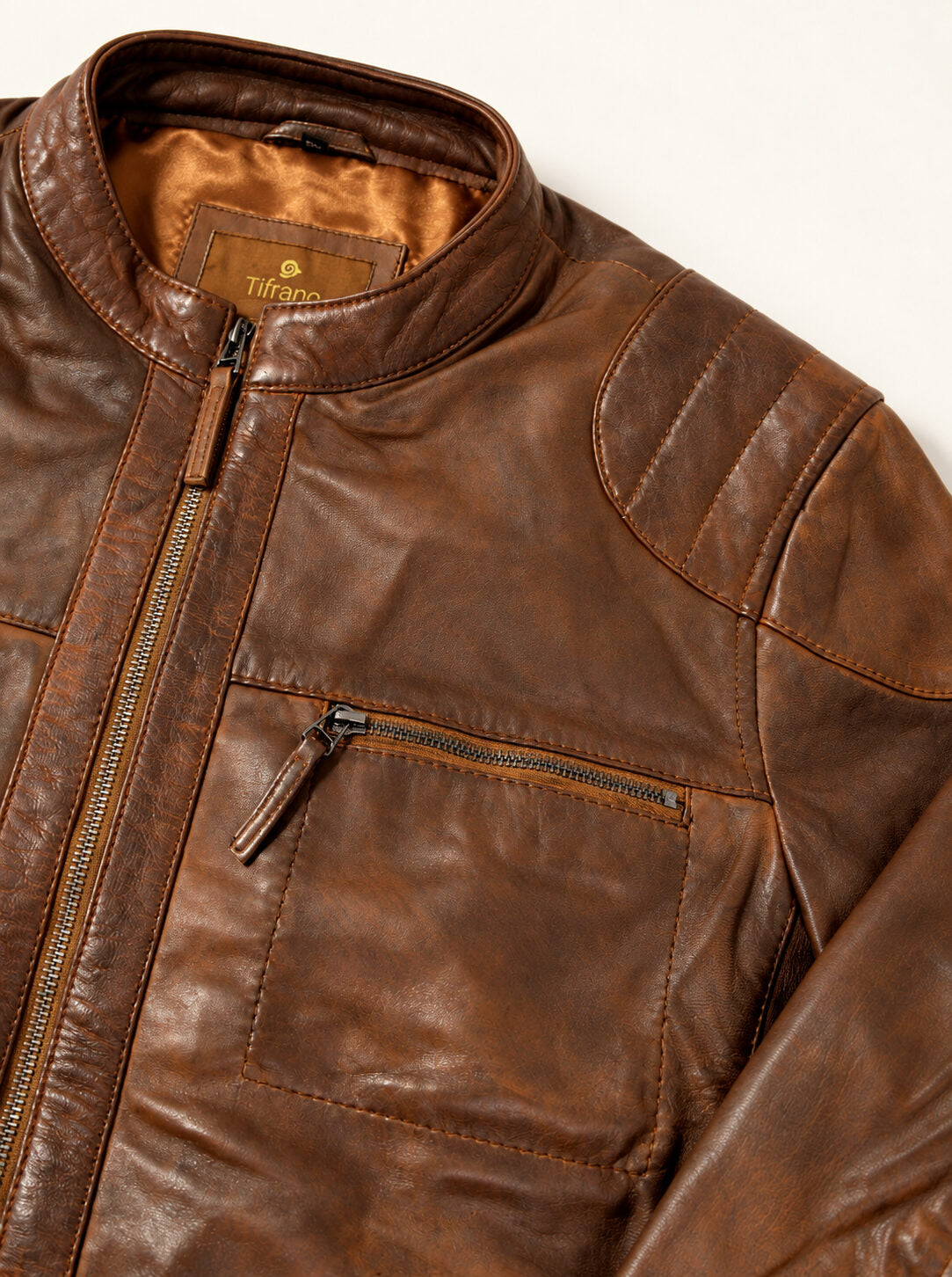Oxford brown leather jacket by Tifrano, close-up detail of leather and zippers