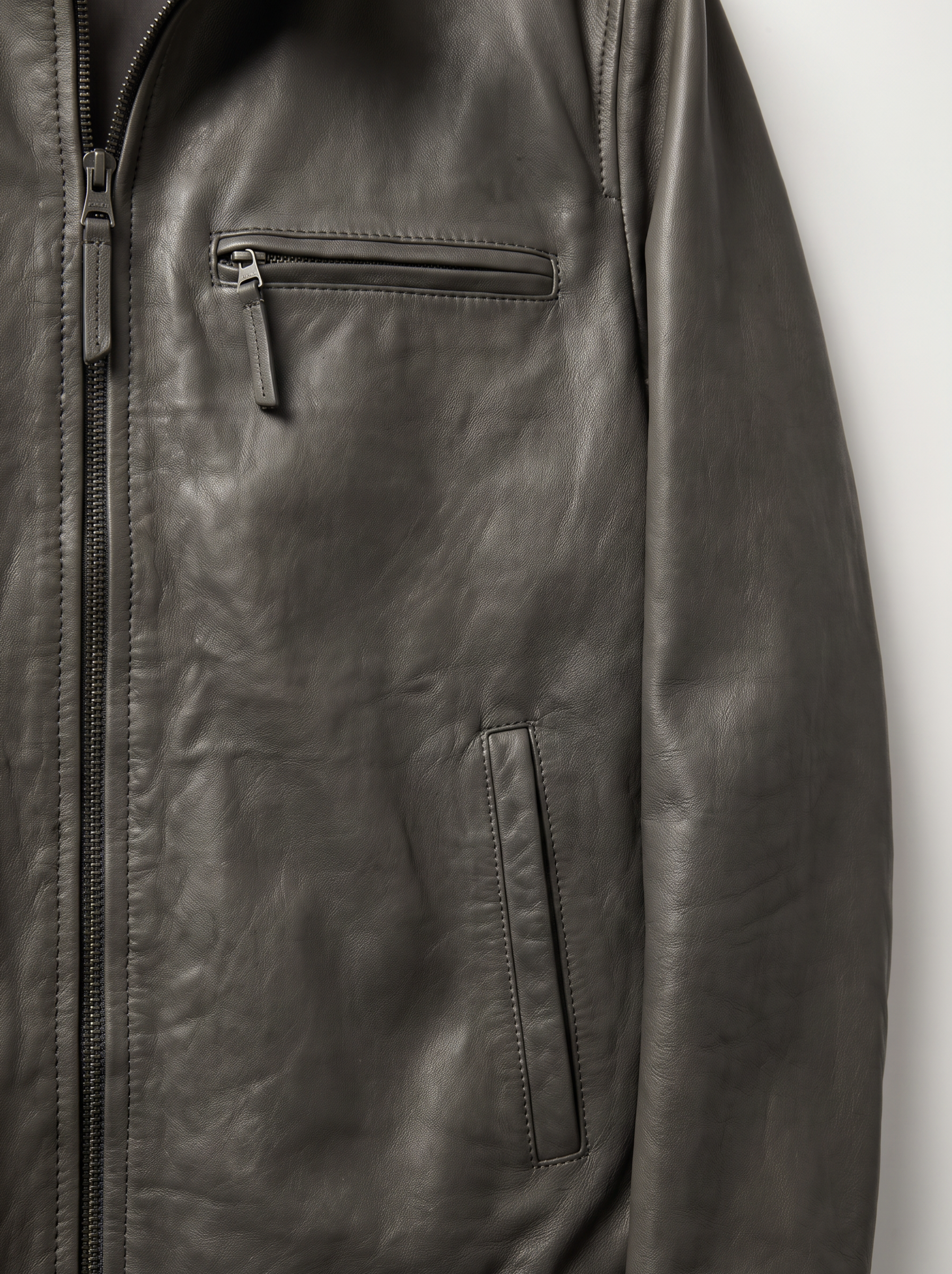 Quebec olive green leather jacket for men, close-up of leather detail