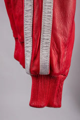 Roma red leather jacket extreme close-up of ribbed cuff and silver stripe, genuine leather texture