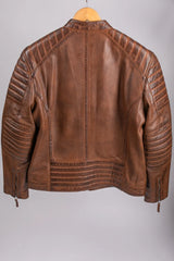 Madrid brown leather jacket back flat lay on hanger showing quilted shoulders and moto seam detail