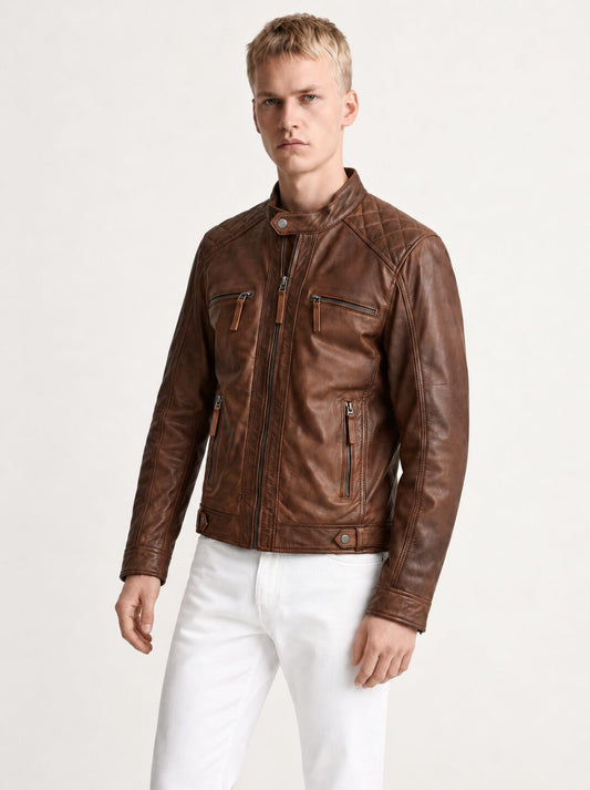 Man wearing the Brujas cognac leather racer jacket, alternate full-body view