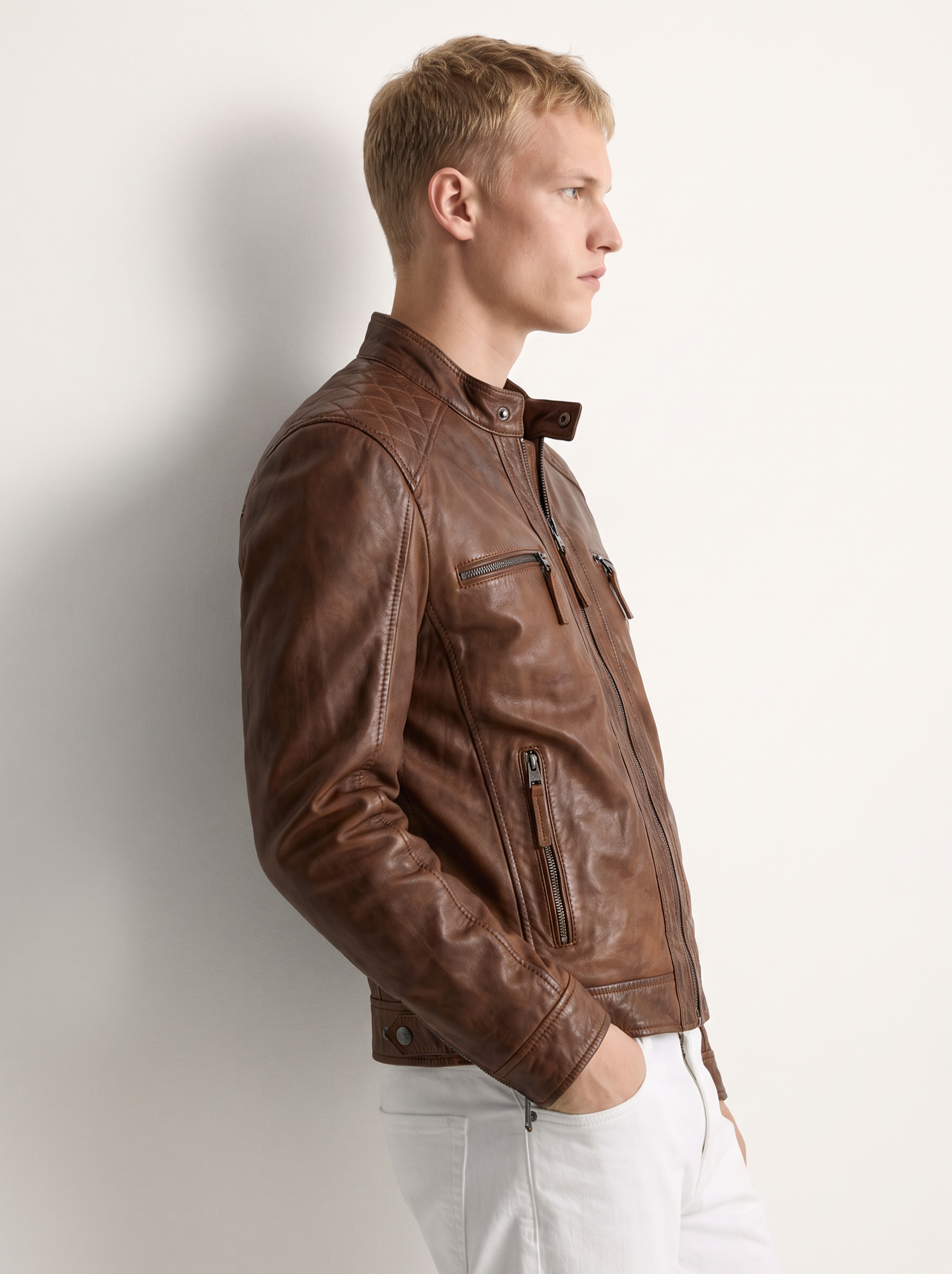 Brujas brown leather jacket for men, worn by a male model, side view | Tifrano genuine leather