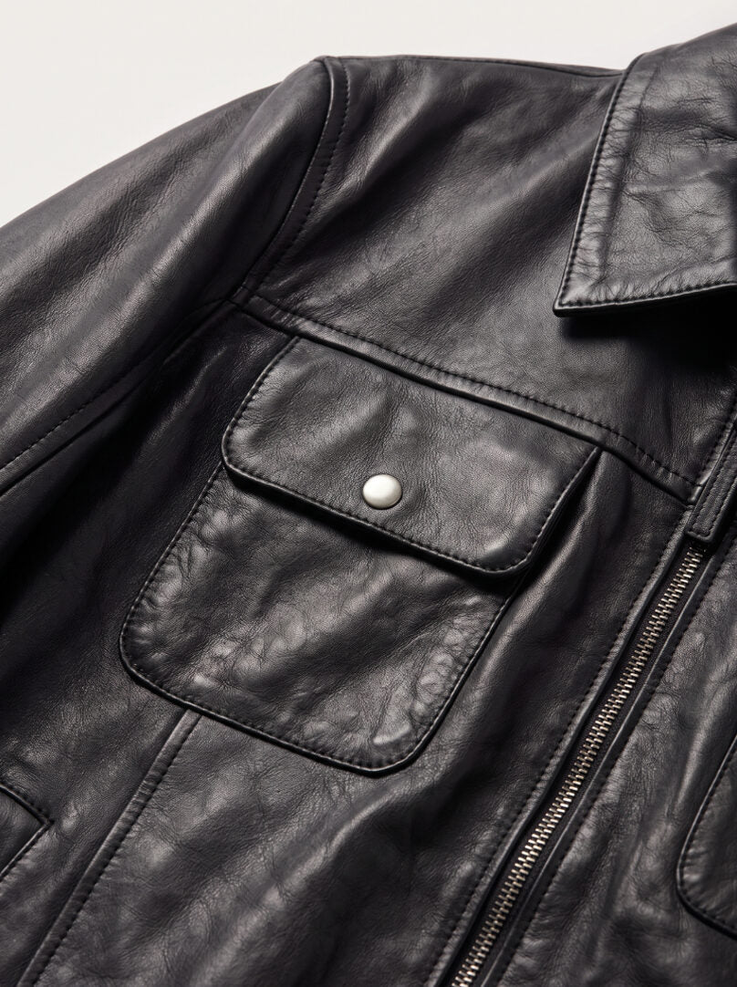 Close-up detail of the Budapest black leather trucker jacket
