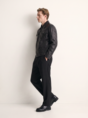 Budapest black leather jacket for men, worn by a male model, side view | Tifrano genuine leather
