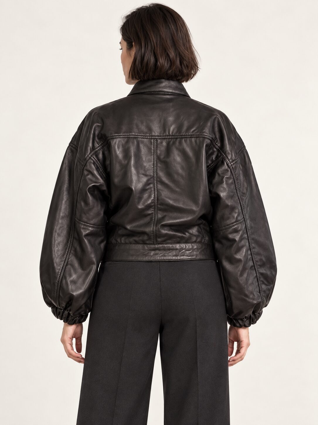 Electra black leather jacket with puff sleeves for women, back view