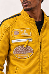 Close-up of the Tifrano MB yellow leather jacket showing the Racing Speed patch and front zip pocket detail