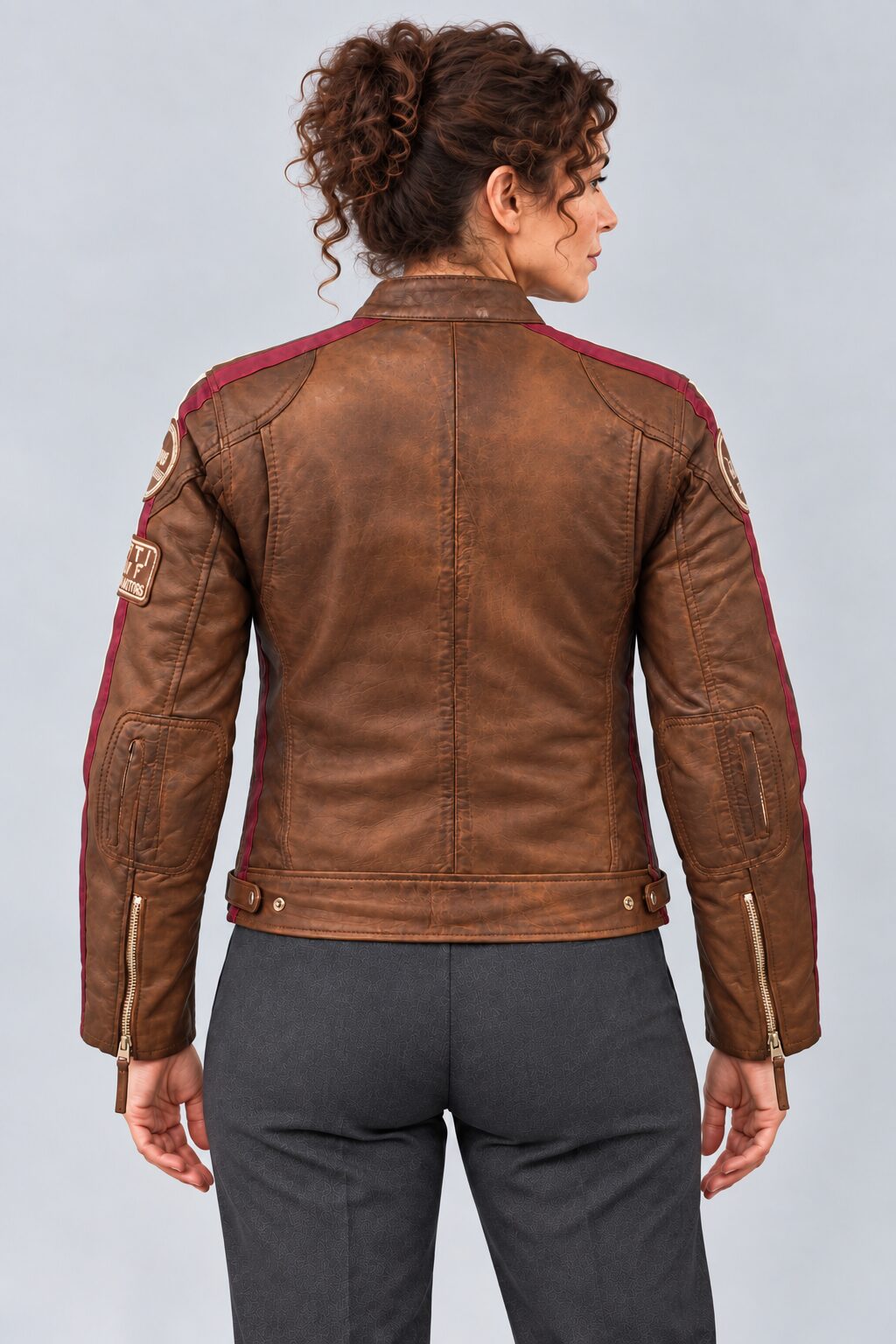Antique brown leather biker jacket for women, back view