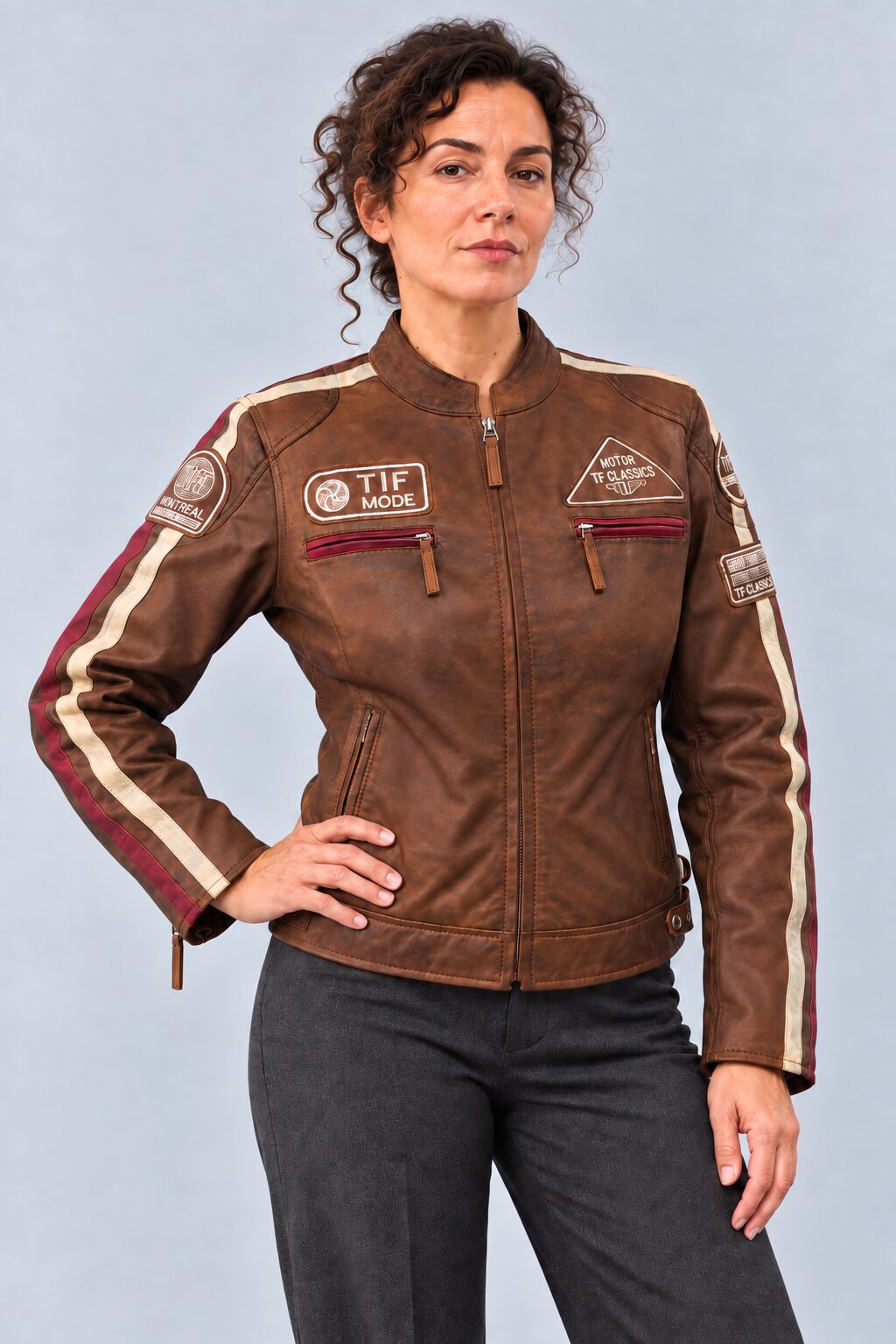 Woman wearing the antique brown leather biker jacket, three-quarter view