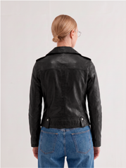 Back view of the Montreal black leather biker jacket on a model, showing belted waist and panel seams