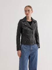 Woman wearing the Montreal black leather biker jacket with jeans - three-quarter view