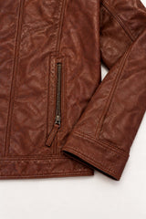 Close-up detail of the Tifrano Mostar brown leather jacket cuff, pocket and leather texture