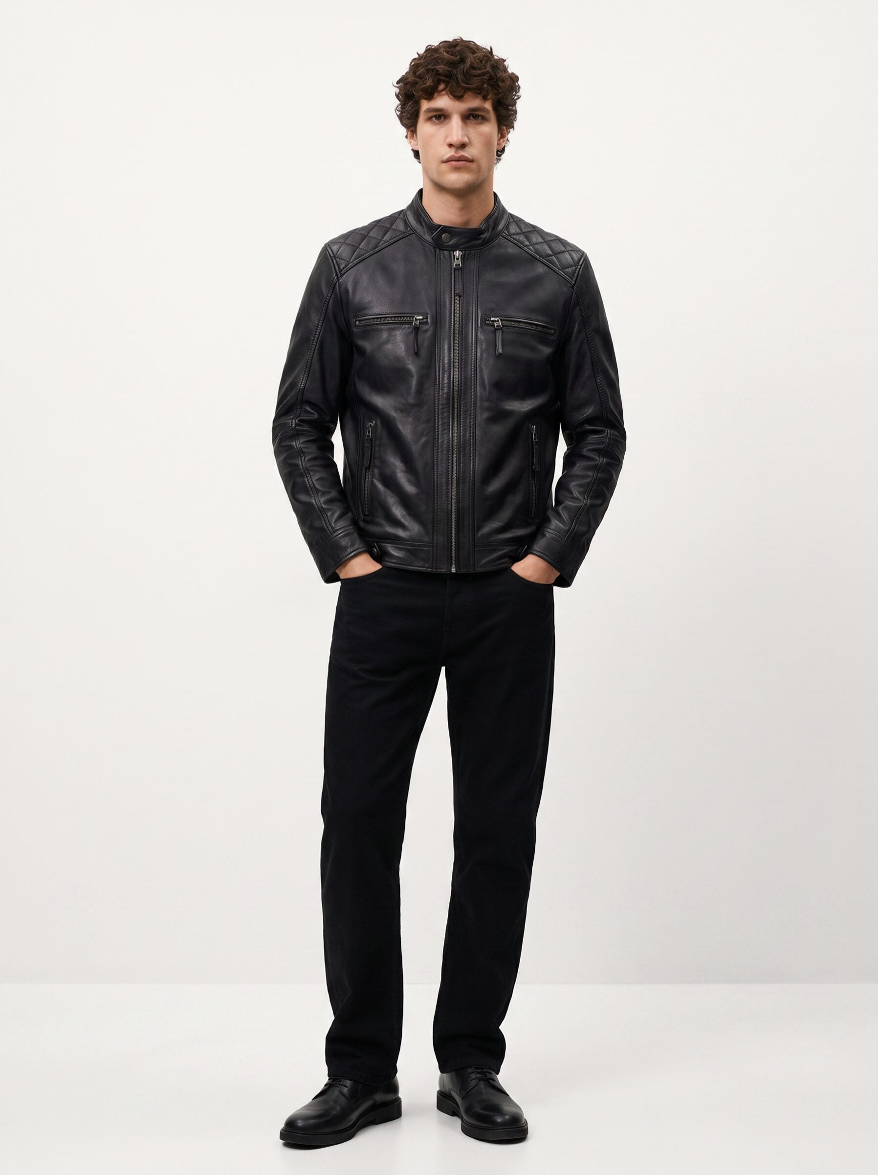 Man wearing the Viena black leather racer jacket, full-body front view
